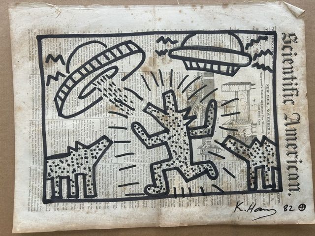 Keith Haring – Keith Haring (1958-1990) - Sans-titre (Chien et soucoupes), Dessin à l'encre sur page de journal "Scientific American"